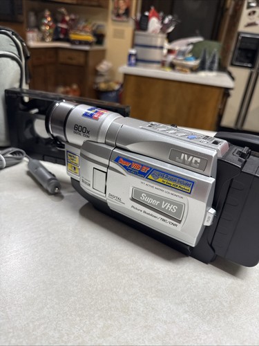 Videocamera compatta super - compatta,